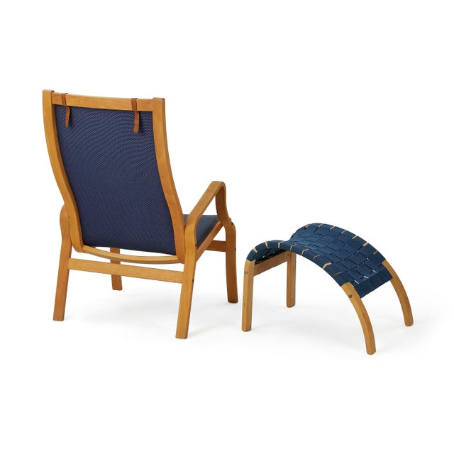 Beech bentwood armchair in original velvet fabric and leather trim and fabric headrest with leather straps. The footrest...