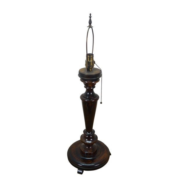 Early 20th century carved mahogany table lamp - broad, round base with three wedge feet supporting an elegant turned...