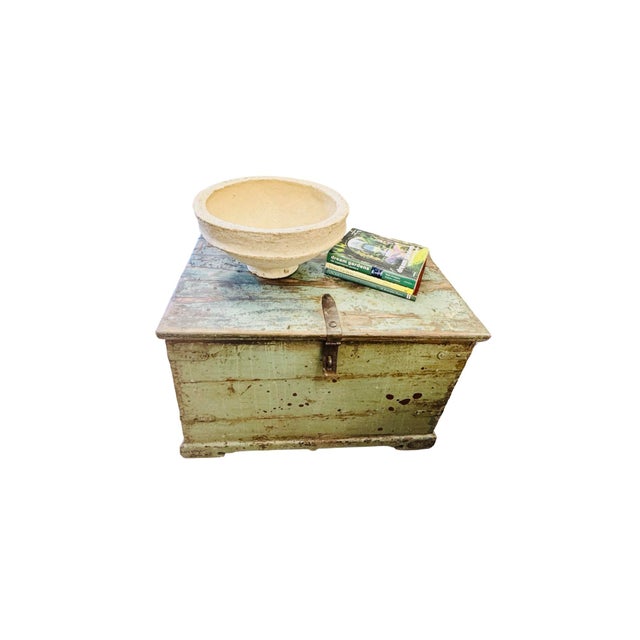 A true one-of-a-kind antique chest with beautifully timeworn paint and old-world charm. Perfect as a coffee table or...