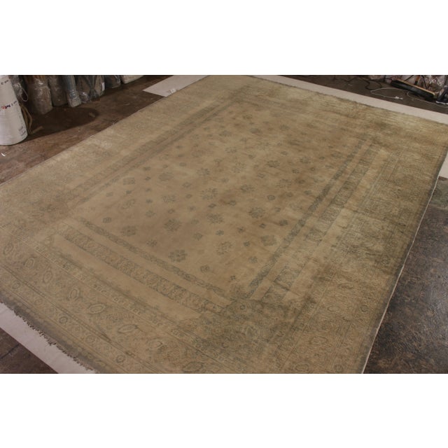 Rug & Kilim welcomes this large scale antique Oushak rug to its exclusive collection of antique rugs. Hand-knotted in wool...