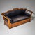 Biedermeier sofa crafted from cherrywood, featuring a multi-curved backrest and sleigh-shaped armrests. Ebonized turned...