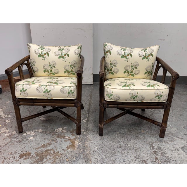Design Plus Gallery presents a Pair of Vintage Bamboo Barrel Chairs from McGuire Furniture. This pair showcases the...