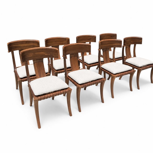 Solid walnut chairs. Modern Klismos dining chairs with upholstered seats cushions. The Robsjohn Gibbings style Klismos...