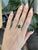 Vibrant 3.7ct Zambian emerald in a classic oval cut, set in solid 14K gold for timeless elegance. Natural diamond accents...