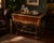A rare and in pristine condition Butler's Cart from Union National Furniture Company. The glossy Mahogany and cherry wood...
