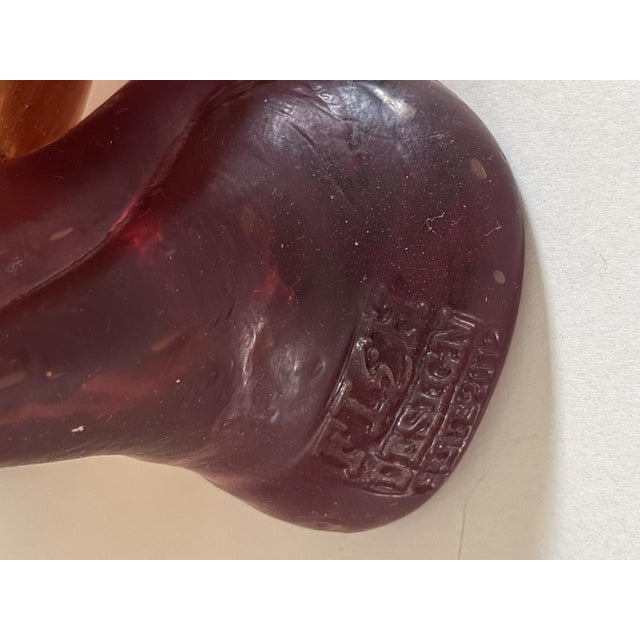 Hand-poured resin in amber with ruby legs. Dual maker’s marks—“Gaetano Pesce” on one foot, “Fish Design” on the...