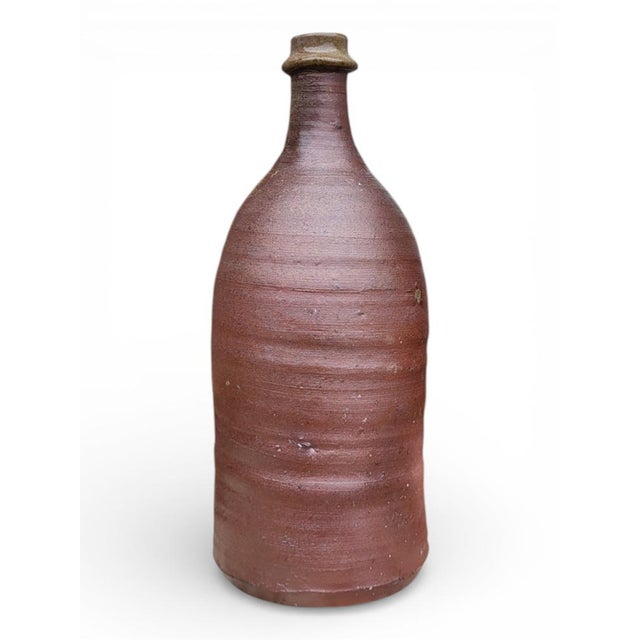 Stoneware bottle by Dominique Lion / Puisaye Height approximately 31 cm Capacity 1.5L Diameter approximately 12.5 cm This...