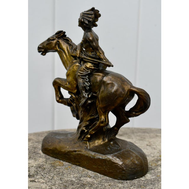 Vintage (1950's) Indian Warrior on Horse Statue has a Western Americana Style. Made of Spelter in a Bronze Colored Finish....