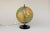 Gdr illuminated globe from 1973. very good condition, surface with age-related patina. paper and plastic on a bakelite...