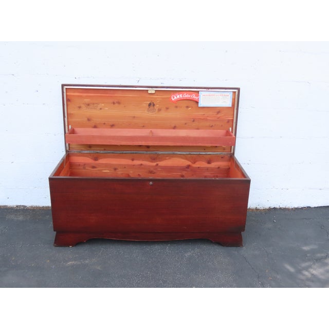 This brilliant Cedar Trunk Chest is made of wood, mahogany, veneer, and cedar wood. The Chest was made by Lane Furniture,...