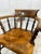 A beautifully preserved Victorian Captain's Chair, handcrafted in elm and birch during the late 19th century and...