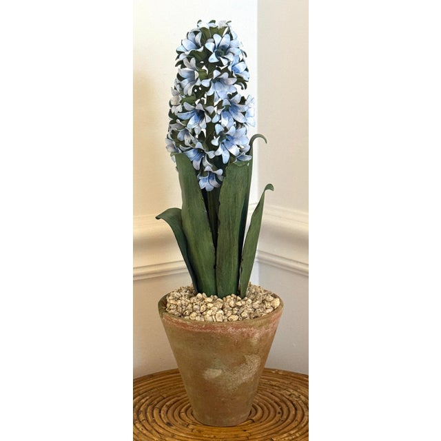Vintage sculptural blue hyacinth. Sculpted and formed out of tole. "Potted" in a real terracotta pot. Finished with...
