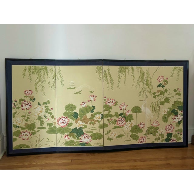 Japanese Byobu four-screen panel of intricately painted flora and fauna scene, including brilliant red-pink lotus and...