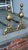 Handsome ball top brass andirons with Fleur de Lis feet. Very hard to come by these days. The brass was lacquered at some...