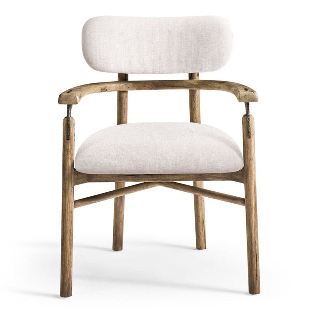 Armchair brings together Scandinavian-inspired simplicity and the warmth of natural materials. Made from solid wood with a...