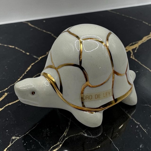 Add a touch of vintage European charm to your collection with this gorgeous porcelain turtle figurine. Hand-crafted in...
