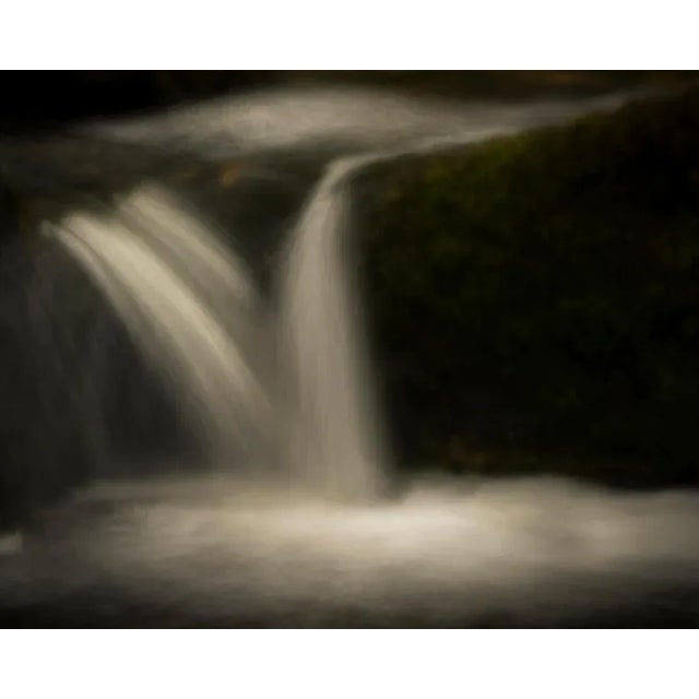 Stream flowing over rocks. Captured in the Yorkshire Dales in the north of England through using intentional camera...