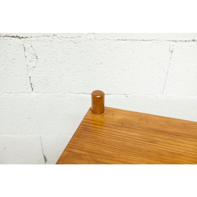 Rectangular Scandinavian shelf from the 1960s, made of solid pine with screw-on round wooden legs. Some minor marks on the...