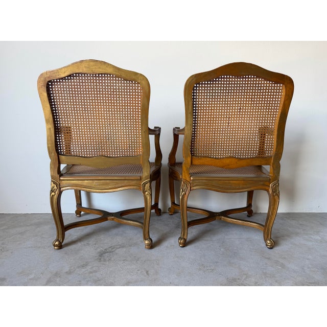 Vintage Hollywood Regency French Louis XV-Style Giltwood Cane Armchairs – A Pair For Sale - Image 4 of 14