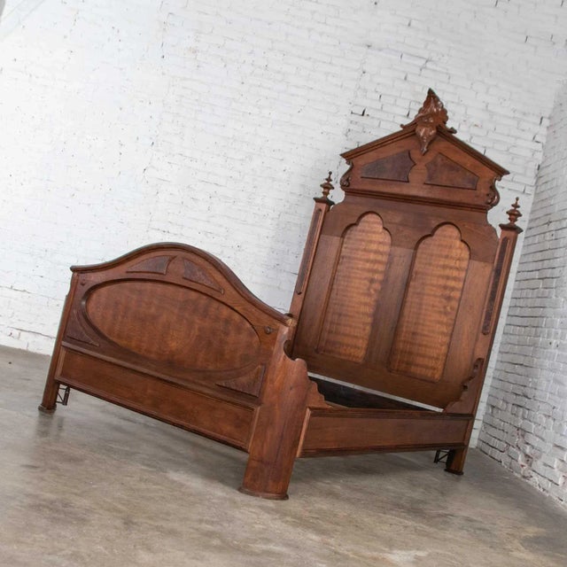 Gorgeous antique Victorian tall Lincoln style full size bed in solid walnut and walnut burl with footboard and siderails....