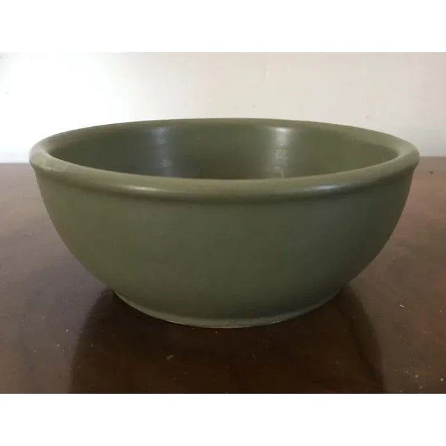 American art pottery Arts & Crafts green pottery bowl marked with incised USA on the base. Heavily potted with attractive...