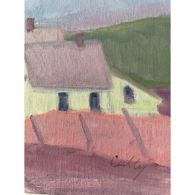 This is a painting of a one room schoolhouse that was done using colors on the color wheel that are next to each other.....