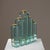 Rare architectural candle holder featuring five solid glass stelae connected by high-quality brass spacers. The design is...