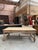 This imposing solid oak castle table has been fully restored. It comprises a wide top with a carved edge, two large...