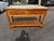 Mid-Century natural bamboo and stone top console table. The bamboo base has a bamboo bottom shelf.and two draws.