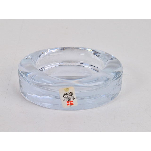 Vintage ashtray Torben Jørgensen for Holmegaard Denmark ‘80 Torben Jørgensen designed this crystal glass ashtray in 1982....