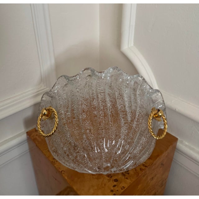Beautiful vintage Italian Murano glass wall sconce. Made using the "graniglia" technique to achieve its textured...