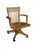A classic vintage banker's desk chair crafted from solid oak with a warm, medium honey finish, dating back to the 1920s...