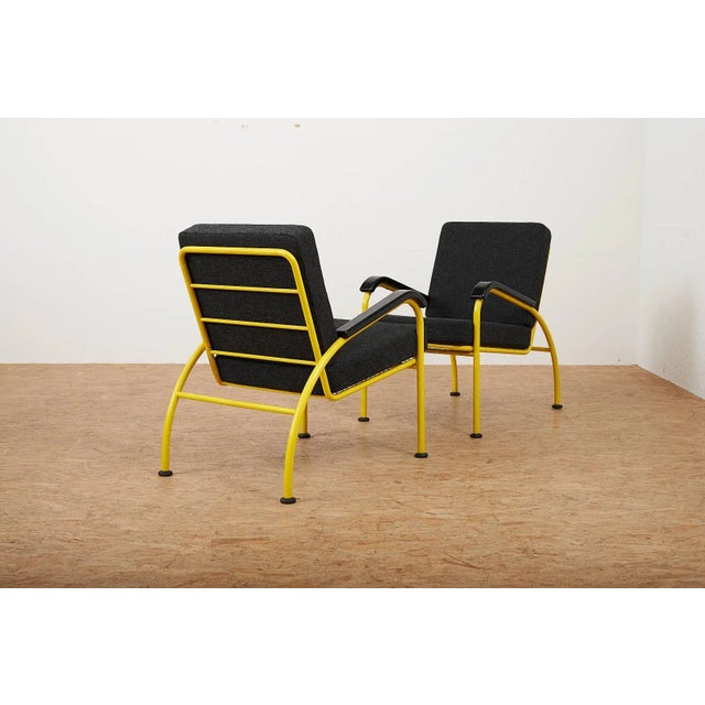 Yellow Tubular Steel Armchairs with Black Bakelite Armrests and Feet and Kvadrat Upholstery from Embru, 1934, Set of 2, in...