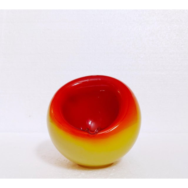 A work of art, an ashtray for one cigarette. Hand blown space age style glass. Design: Dragan Drobnjak Produced in the...