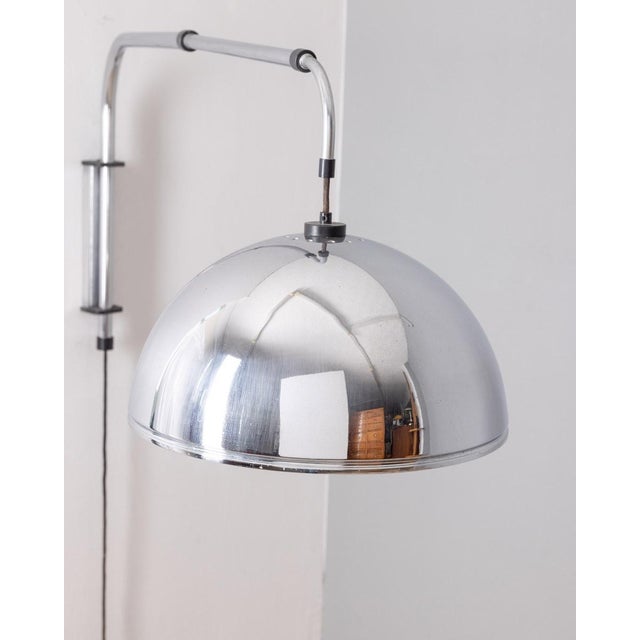 Chromed metal wall lamp, adjustable in width and height via the counterweight where the switch is located, Italian design,...