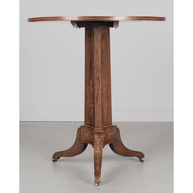 A fine 19th century French Restauration style tilt-top marquetry guéridon, or center table. Beautiful bookmatched veneer...