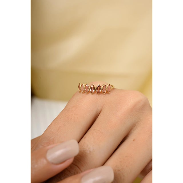 This is part of Chairish’s Fine Jewelry assortment. Stackable Pink Tourmaline Half Eternity Band Ring for Her in 18K Gold...