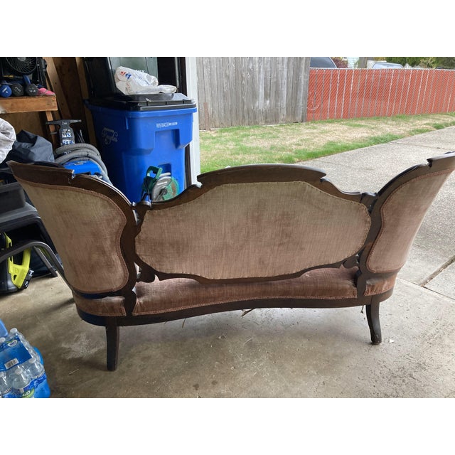 The Rose-Back Settee was hand crafted by a slave in 1848 on a farm in Raywick, Kentucky. This was 15 years before the...