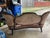 The Rose-Back Settee was hand crafted by a slave in 1848 on a farm in Raywick, Kentucky. This was 15 years before the...