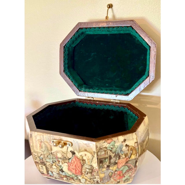 An octagonal vintage trinket box featuring wraparound illustrations by Dutch artist Anton Pieck, known for his detailed...