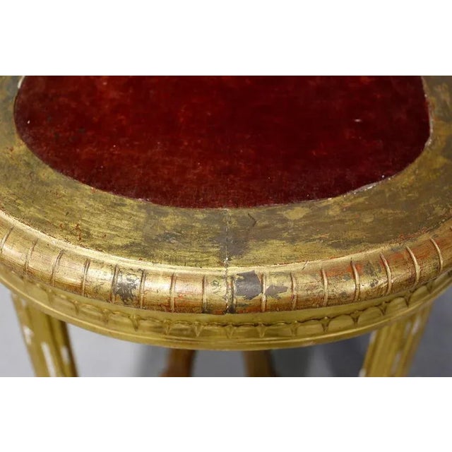Antica Consolle in wood gilded end 1800 beginning 1900. The particularity of the console and its top covered with original...