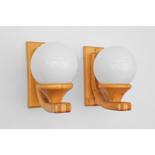 Huge lovely wooden pendant lamp by domus, 1970s, italy executed in pine wood and opline glass. the wall lights comes with...