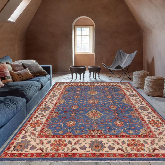 Enhance your home with this exquisite hand-knotted Kazak rug, crafted from fine hand-spun wool and dyed with all-natural...
