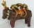 This clay bull was hand-sculpted in Italy. It's festooned in roses and brightly glazed in several colors - the body of the...
