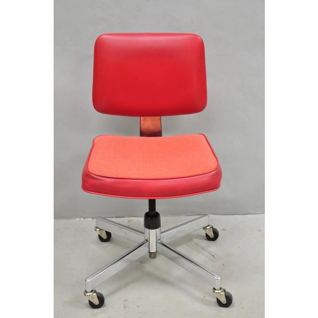 Vintage Mid Century Modern Red Adjustable Height and Back Rolling Chrome Office Desk Chair by HON. Circa Late 20th...