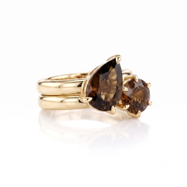 Embrace understated luxury and organic beauty with the rich espresso tones of natural smoky quartz. This minimalist stack...