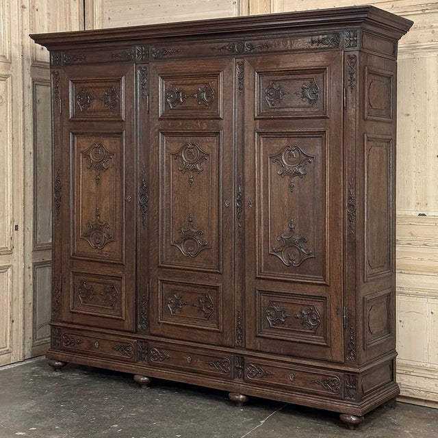 Grand 19th Century Louis XIV Liegeoise Triple Armoire is an amazing work of the cabinetmaker's art! Hand-crafted and...