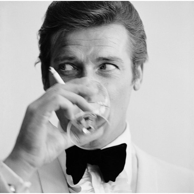 Shaken Not Stirred' Roger Moore as James Bond Contemporary Archival Black and White Photograph Print From the Original Negative by Peter Ruck - 20x20 For Sale - Image 4 of 4