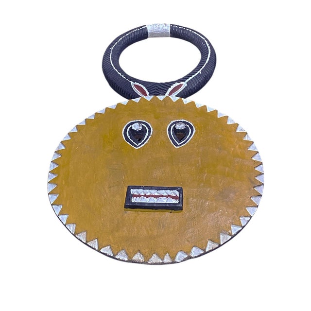 A beautiful and unique vintage hand carved of one piece of wood Goli tribe mask that originates from the Akan people from...