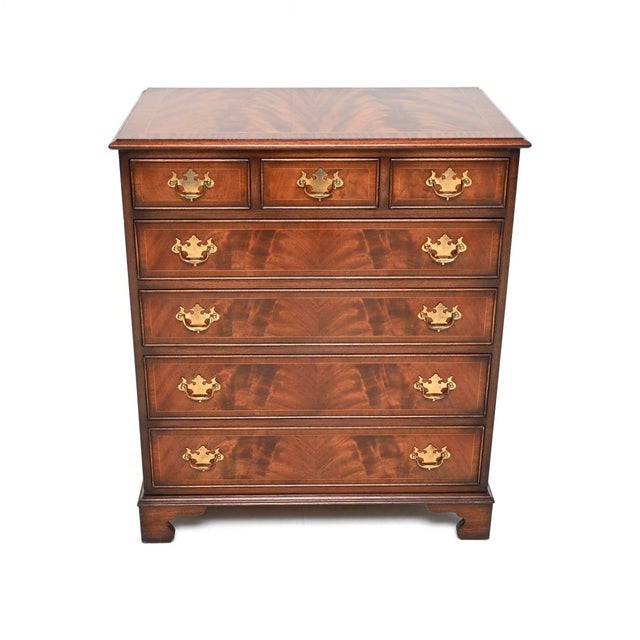 An impressive and extremely well made antique Georgian style chest of drawers from around the 1950’s. It is of superb...